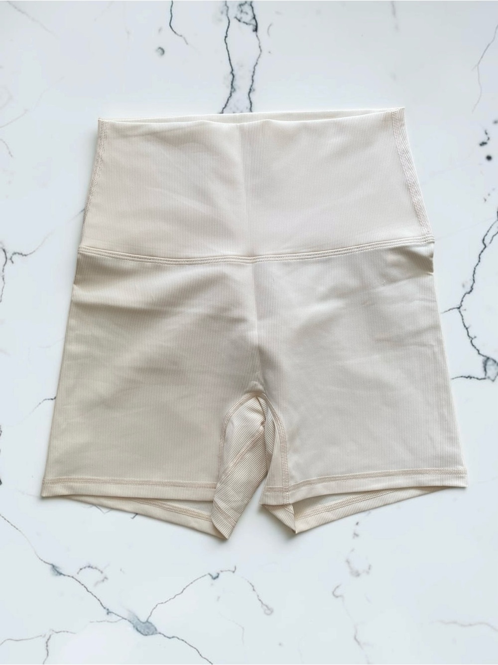 NWOT High-Waist Ribbed Cream Biker Shorts with Peach Undertones